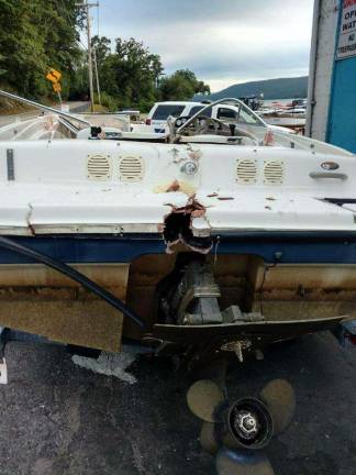Two men remain critically injured after hit-and-run boat crash on Greenwood Lake Four people were injured in this 18-foot Bayliner boat after a hit-and-run crash on Greenwood Lake Monday.