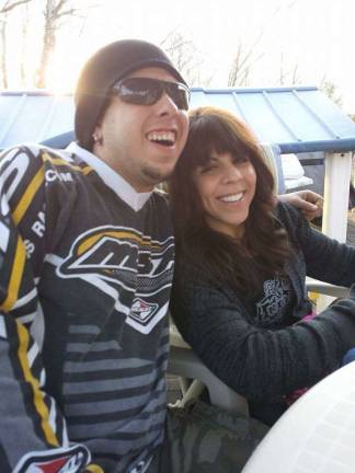 Hometown mechanic Photo provided Eric Schoemer, owner of Highlander Auto, and his wife Karen Lucas.