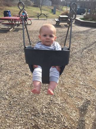 Oh Baby it's Spring! Baby Photo Contest Photo, Trish Gondelman of Sparta Lucas is swinging and enjoying a spring day at the park.