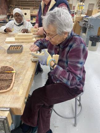 Jersey Hills Wood Carvers marks 40th year Agatha Sherin carves during a recent meeting.