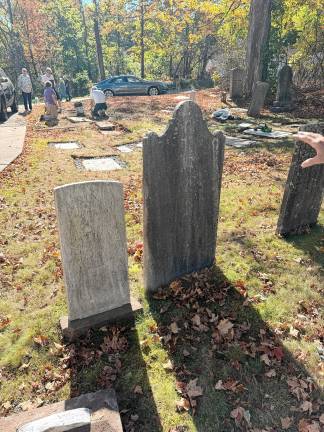 Church members restore tombstones Every tombstone in the graveyard dates to the 1800s.