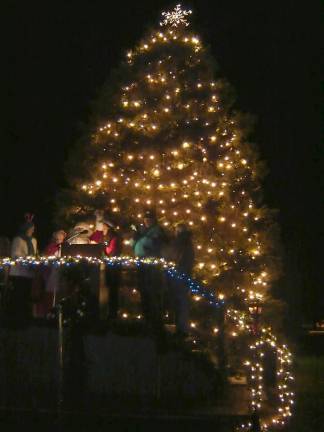 The tree that was decorated annually for the holiday season in West Milford is seen in better times. The tree was ill and was recently cut down. File photo by Ann Genader.