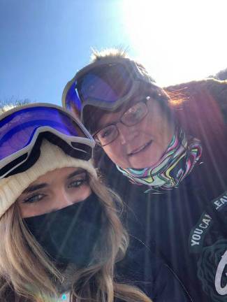 Erin McCarthy and her daughter, Emma, who both learned how to snowboard last month at Mt. Peter in Warwick, N.Y.