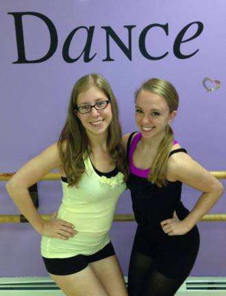 Melissa Martinique and Shayla Doherty are longtime dancing students at Precision Dance Academy and help instruct the younger students.