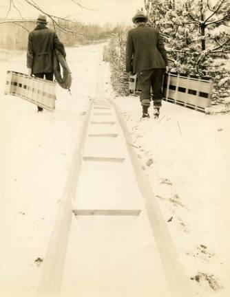 A one-eighth mile long toboggan slide known as the “Silver Streak” was located on the westerly side of Bald Hill in what would eventually become Smith’s Clove Park in Monroe. Photo provided by the Monroe Historical Society.