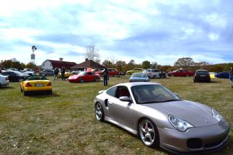 Friends of Wallisch Homestead host car show A field of clean, well-maintained custom and stock exotic super cars are shown.