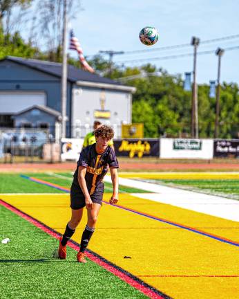 Sports roundup: Highlanders aim to build on success Ethan Amundson throws the ball into play.