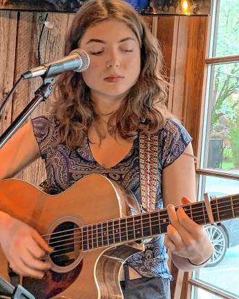 Music and seafood - perfect together Sydney Leigh performs Friday, June 13 at the Vreeland Store. (Photo by James Campion)