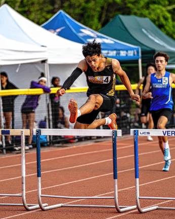 Diodonet wins gold medal WM1 Lorenzo Andrade leaps in the 400-meter hurdles at the NJSIAA North Jersey, Section 1, Group 2 Championships. He won silver. (Photos by TJ Nolan)