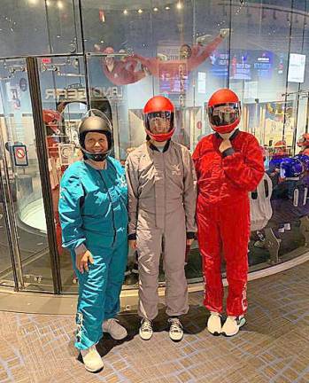 Theses scouts prepare to experience the sensation of flying in iFLY’s tate-of-the-art vertical wind tunnels.