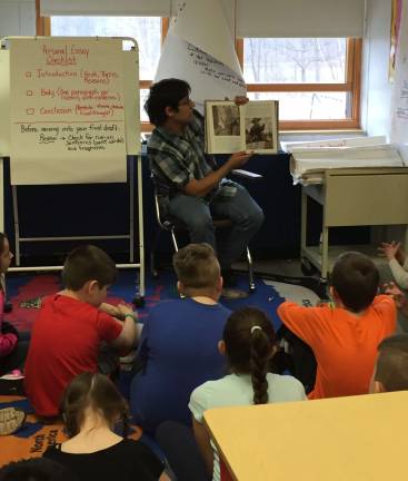 West Milford celebrates 'Read Across America' Board of education Trustee Will Cytowicz shares a favorite book with students on Read Across America Day, celebrated on Dr. Seuss's birthday, March 2.