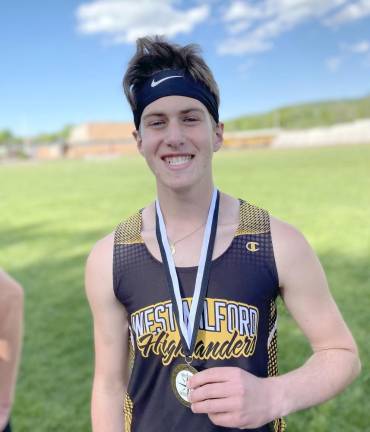 Michael McCloskey with his medal.