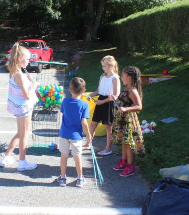 St. Joseph Church welcomes new priest at annual parish picnic Both kids and adults had plenty of games to play throughout the afternoon.