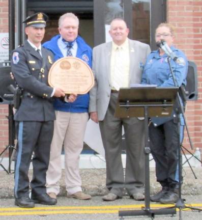 Hewitt. West Milford Police have Knights of Columbus support Police Chief James Devore holds a plaque supporting police from Our Lady Queen of Peace Knights of Columbus Council 6139. From left are Chief Devore, Knight John Buechel, Grand Knight Cliff Field and PBA President Patrolwoman Jill Brickman.