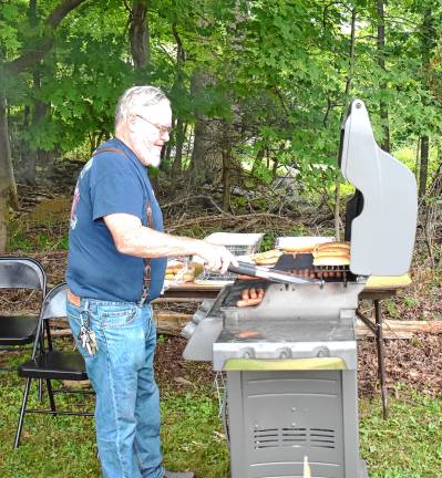 Photos: Veterans of Foreign Wars Post 7198 flag raising VFW member Mike Dotson mans the hot dog grill.