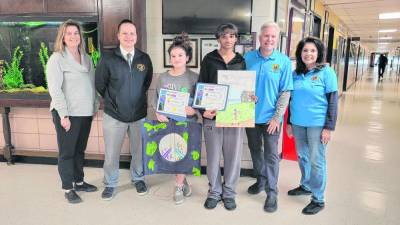 Macopin Middle School students Ava Trahan and Ella Biesieda placed first and second, respectively, in the West Milford Lions Club Peace Poster Contest. (Photo provided)