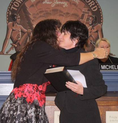 I do solemnly swear... Afterwards, Battaglia congratulated the mayor.