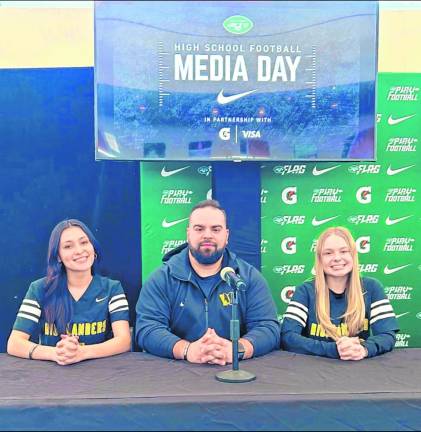 Representing West Milford High School at the Girls Flag Football Media Day on Feb. 22 at MetLife Stadium were, from left, Tiffany Vargas, head coach Matt Keyzer and Kailey Maskerines.