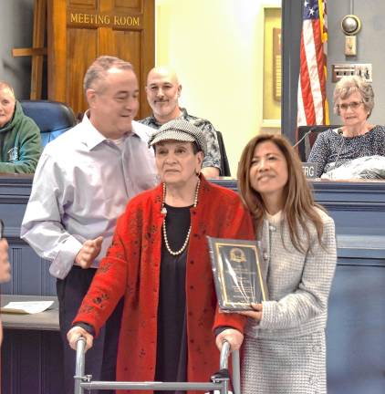 Blom honored for volunteer work JoAnn Blom poses with her family.