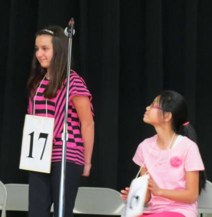 'Stellar' speller wins PK bee Juliet Badaan correctly spells "saffron" and "stellar" for the win with the 27th word in the elimination round of the PK Spelling Bee as first runner up Leah Payne looks on.