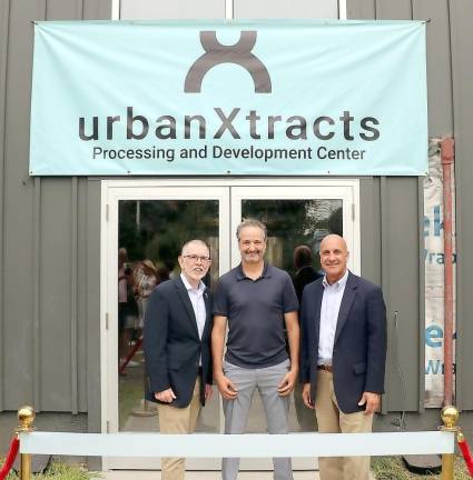 UrbanXtracts CEO, Eran Sherin (center) poses with Town of Warwick Supervisor Michael Sweeton (left) and Attorney Robert Krahulik, president of the Warwick Valley Local Development Corporation.