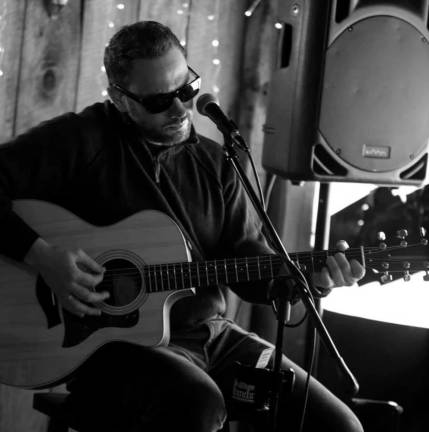 Acoustic performances on tap Guitarist and vocalist Pauly Di Dio will play Saturday night at Pennings Farm Market in Warwick. (Photo courtesy of Pauly Di Dio)