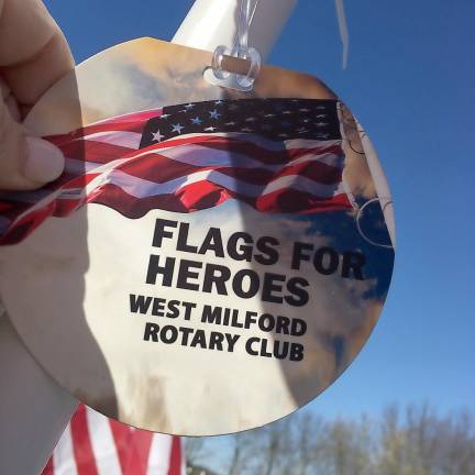 Each flag will bare a medallion honoring the name of a hero from a community member’s life to be remembered.