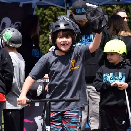 GWL Skatepark hosts first annual skate contest Gavin Donaldson celebrates after winning the scooter Open Jam Session for competitors 10 and Under at the Do It For Dale Skate Contest.