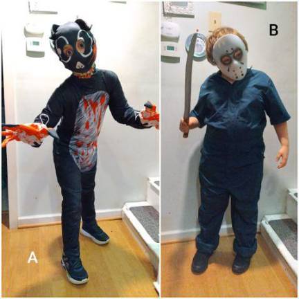 Halloween isn’t canceled Chester, N.Y., kids Quinton (left) and Issac (right) did a moonlit “graveyard” candy hunt (Photo provided)