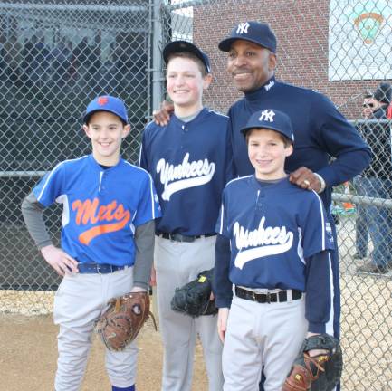 Yankee Willie Randolph kicks off the Little League season Willie Randolph poses with the catchers who took the ceremonial first itches. From left, Danny Sullivan, Matthew Evanchick and Corbin Johnson.