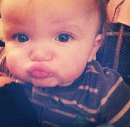 Oh Baby it's Spring! Baby Photo Contest Photo, Tonia Dooner of Sussex "Kissy face." Daniel who just turned 1 years old.