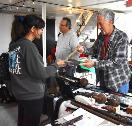 Joe Jorgensen explains a detail on a recovered antique tool. (Photos by Fred Ashplant)