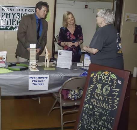 Staying healthy Sean Kean and Anne Kane of West Milford Physical Therapy talk to an attendee of the health fair.