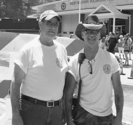 Community commissions Tanker 6 Along with West Milford Police, volunteer firemen from West Milford Co #6, Roy Sconfienza, on left, and Rich Ploenes, had their work cut out for them directing scores of fire companies, visitors and residential traffic on Ridge Road. Photo by Ginny Raue