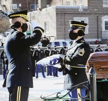‘He got cheated out of time, but he didn’t get cheated out of life’ At West Point, the flag is handed over.