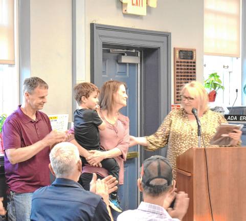 Blom honored for volunteer work Dorrie Torp, center, shared the 2024 Volunteer of the Year Award.