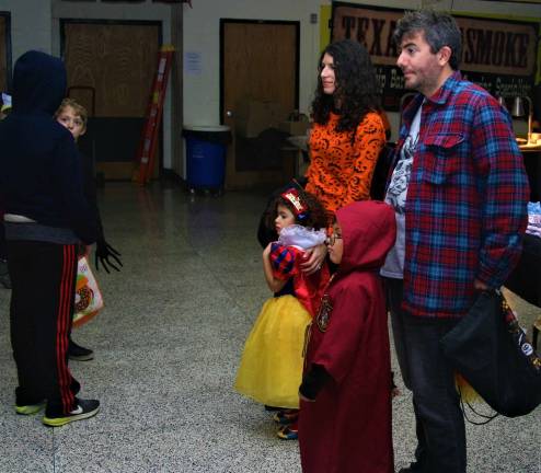The Tahan family, Paul, Maria, Jacob, 6, and Lillian, 3, take part in the festivities at the second annual Spooktacular event at West Milford High School Saturday.