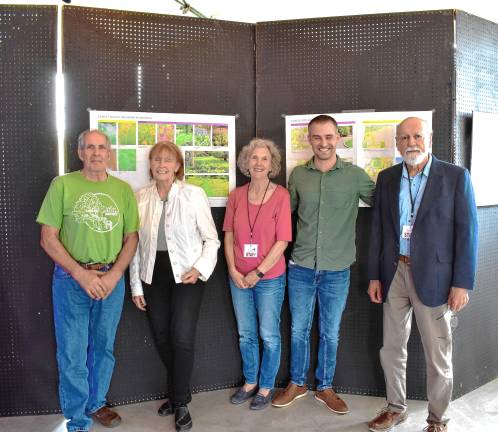 Wallisch master plan presented Board members of the Friends of Wallisch Homestead pose with Nancy Gregory DeVries, whose family once owned the property. From left are Mark Lynch, DeVries, board president Sue Lynch, Michael VanHooker and Ron Perez.