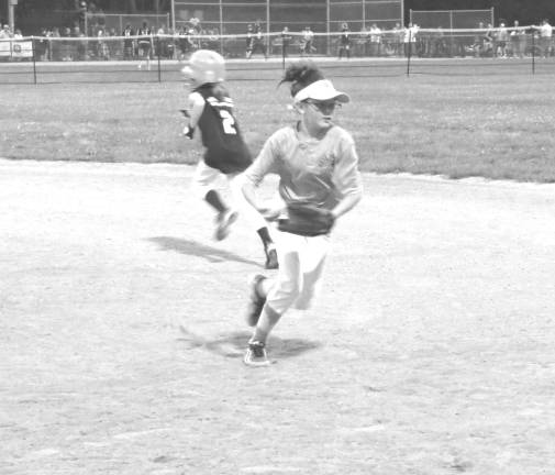 Softball season ends on a high note It was a good play by Gold/West Milford PBA first baseman.