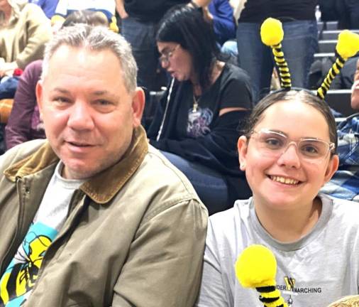 Michael Walker and his daughter Charly enjoy the show. Walker’s son Johnny is a saxophonist in the West Milford High School Highlander Band.