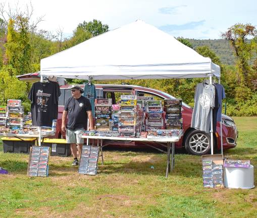Car show attracts 400 A vendor sells model cars.