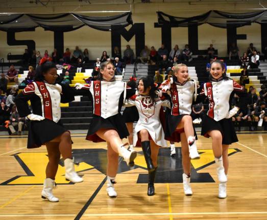 Clifton High School majorettes kick up their heels.