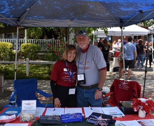 Annual Street Festival draws crowd Marianne and Mike Schmidt were at the Hudson Valley Honor Flight table. The nonprofit organization treats veterans to a free trip to Washington to visit monuments and sites, such as Arlington National Cemetery.