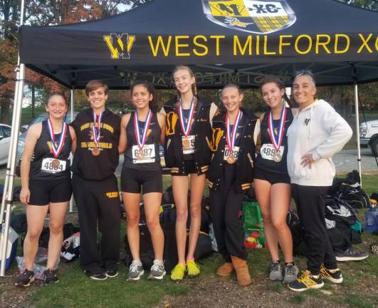 Woodland Park. WMHS XC Teams score big at County Championships