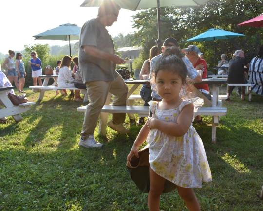 Local green thumbs harvest top honors Dahlia Colon, daughter of Ozzie Colon and Lauren Mariotti, with the garden toolbag awarded to winning gardens. The family’s Warwick, N.Y., garden took second place. (Photo by Becca Tucker)