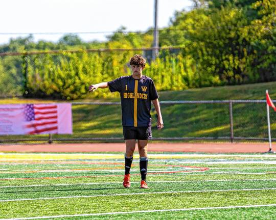 Sports roundup: Highlanders aim to build on success Senior Ethan Amundson directs his teammates on the field.