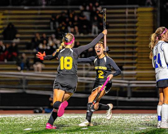 Highlanders win 7 in a row Ava Brock celebrates a goal with Gianna Whites.