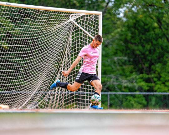 Sports roundup: Highlanders aim to build on success Senior goalie Dominic Lenior kicks the ball into play.
