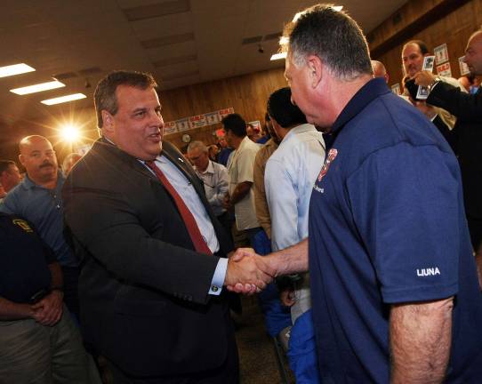 Christie coming to West Milford Tuesday's town hall meeting at PAL first in township Photo from www.state.nj.us/(Governor's Office/Tim Larsen) Governor Chris Christie shakes hands with union members before speaking at the Union Hall Meeting for the Building and Construction Trades Council in Perth Amboy on Wednesday, Oct. 3, 2012.