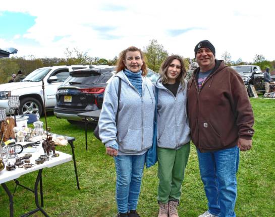 Antiques fair attracts 1,000 From left are Donna, Jessica and Tom Egidio, who are shopping at the event.